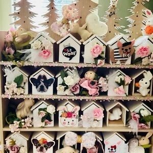 21 drawer Spring boxes adorned with bunnies and dogs.